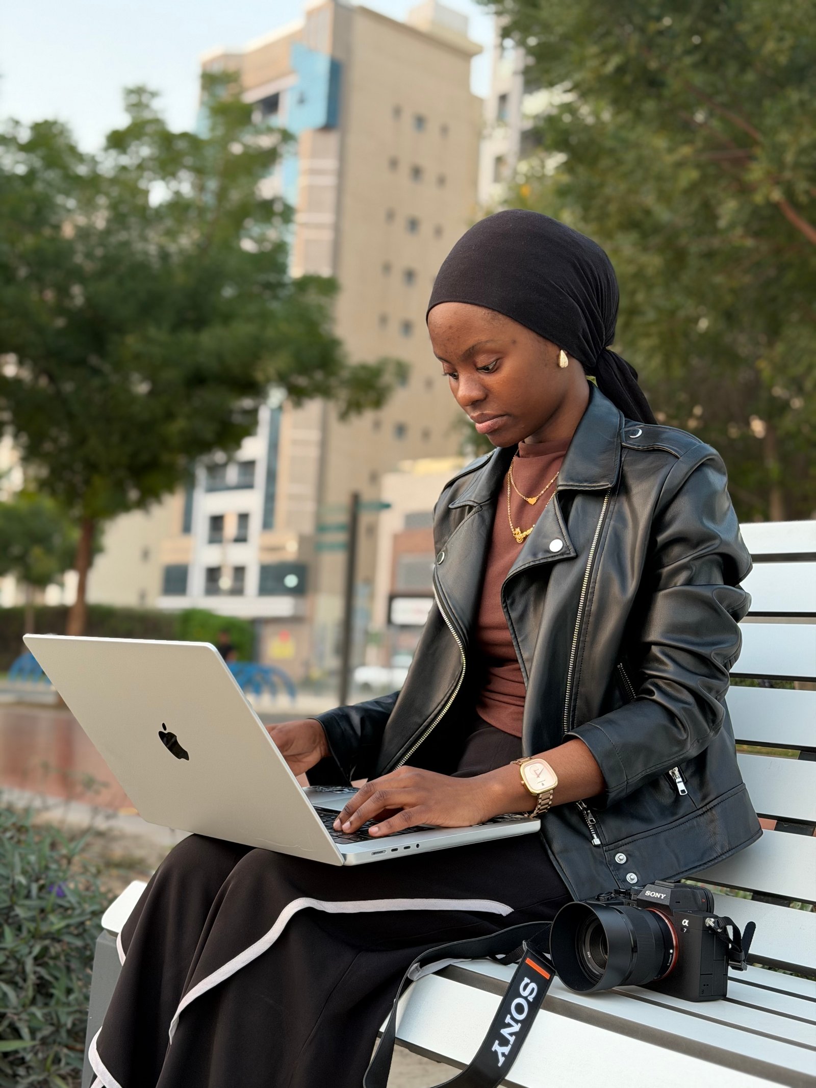 Bingi Conny analyzing marketing analytics on laptop